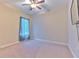 Bedroom with carpet and natural light from window at 6303 Hawk Grove Ct, Wesley Chapel, FL 33545