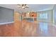 Open kitchen featuring stainless steel appliances and an island with granite countertops at 6303 Hawk Grove Ct, Wesley Chapel, FL 33545