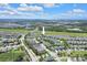 Aerial view showing the home's location within a residential community with nearby waterways at 6518 Salt Creek Ave, Apollo Beach, FL 33572