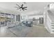 Bright open-concept space with seamless flow, neutral tones, and expansive views, creating a comfortable atmosphere at 6518 Salt Creek Ave, Apollo Beach, FL 33572