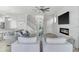 Spacious living area with an open layout, modern fireplace, and seamless transition to the kitchen and dining spaces at 6518 Salt Creek Ave, Apollo Beach, FL 33572
