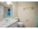 Bathroom featuring a single sink vanity and a shower with a blue curtain at 7020 Oakview Cir, Tampa, FL 33634