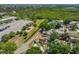 Overhead shot showcasing a home's proximity to parking, a recreation park, and a lush nature preserve at 7491 Cedar Ne St, St Petersburg, FL 33702