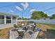Spacious backyard with patio, firepit, and seating area, perfect for entertaining at 7491 Cedar Ne St, St Petersburg, FL 33702