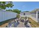 Cozy backyard fire pit with seating for outdoor enjoyment at 7491 Cedar Ne St, St Petersburg, FL 33702