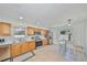 Updated kitchen featuring stainless steel appliances, wooden cabinets, tile flooring and eat-in breakfast nook at 7491 Cedar Ne St, St Petersburg, FL 33702