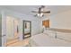 Calm primary bedroom featuring neutral tones, natural light, and ample storage, offering a comfortable and relaxing retreat at 7491 Cedar Ne St, St Petersburg, FL 33702