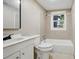 Cozy bathroom featuring a tub and shower combination and updated vanity at 8215 N 12Th St, Tampa, FL 33604