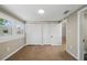 Comfortable bedroom featuring carpeted floors, double closets, and lots of natural light at 8215 N 12Th St, Tampa, FL 33604