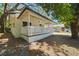 Inviting front porch featuring a charming white picket fence and a cozy ambiance at 8215 N 12Th St, Tampa, FL 33604