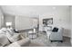 Open-concept living room featuring contemporary decor and an open floor plan at 8409 Lantana Dr, Seminole, FL 33777
