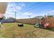 Backyard includes playset and a fire pit at 3748 Redwood Dr, Holiday, FL 34691