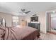 Cozy bedroom with ceiling fan and dresser at 3748 Redwood Dr, Holiday, FL 34691