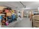 Spacious garage interior featuring a washer, dryer, and ample storage space for tools and equipment at 3748 Redwood Dr, Holiday, FL 34691