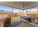 Screened patio has fenced backyard view at 3748 Redwood Dr, Holiday, FL 34691