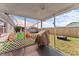 The back patio offers covered play and cooking spaces at 3748 Redwood Dr, Holiday, FL 34691