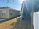 The backyard features lush trees and a well-maintained lawn at 11318 Laurel Brook Ct, Riverview, FL 33569