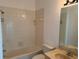 Bathroom with a standard bathtub and vanity at 11318 Laurel Brook Ct, Riverview, FL 33569