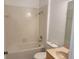 Bathroom featuring a standard bath tub, toilet, and vanity at 11318 Laurel Brook Ct, Riverview, FL 33569