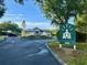 Entrance to building with lush tropical landscaping and plenty of parking at 11318 Laurel Brook Ct, Riverview, FL 33569