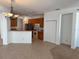 Kitchen featuring tile flooring and wood cabinets at 11318 Laurel Brook Ct, Riverview, FL 33569