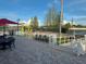 Community playground with swings, slides, and picnic area near the pool at 11318 Laurel Brook Ct, Riverview, FL 33569