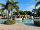 Beautiful swimming pool with tropical landscaping and a central area to relax and unwind at 11318 Laurel Brook Ct, Riverview, FL 33569