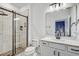 Stylish bathroom with glass-enclosed shower, modern fixtures, and ample counter space at 11422 Calusa Trails Way, Riverview, FL 33569