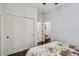 Bright bedroom with closet and doors leading to other areas of the house at 11422 Calusa Trails Way, Riverview, FL 33569