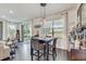 Open dining area with sliding glass door to the backyard, connecting indoor and outdoor living at 11422 Calusa Trails Way, Riverview, FL 33569