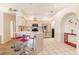 Bright kitchen features a breakfast bar with red bar stools and stainless steel appliances at 13403 Bolton Ct, Spring Hill, FL 34609