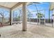 A large screened in patio with plenty of room to create an outdoor living space at 13403 Bolton Ct, Spring Hill, FL 34609