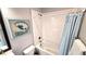 Clean bathroom with a single vanity, toilet, and shower/tub with light blue shower curtain at 17212 Balance Cv, Land O Lakes, FL 34638