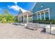 Well-maintained building exterior featuring benches and accessible access with ample parking spaces at 17212 Balance Cv, Land O Lakes, FL 34638