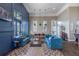 Spacious lounge area features two large sofas and decorative accents at 17212 Balance Cv, Land O Lakes, FL 34638