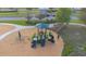 Playground featuring play structure, slides, climbing web, promoting active fun for children at 17212 Balance Cv, Land O Lakes, FL 34638