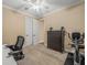 Bonus room with exercise equipment, a ceiling fan and natural light at 1804 Bella Casa Ct, Tampa, FL 33618