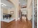 Grand foyer with hardwood floors, staircase, and view into the living room at 1804 Bella Casa Ct, Tampa, FL 33618