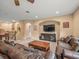 Spacious loft featuring leather sofas, TV, and staircase at 1804 Bella Casa Ct, Tampa, FL 33618