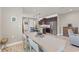 Open dining area with natural light, adjacent to the kitchen and living space at 18872 Noble Caspian Dr, Lutz, FL 33558