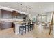 Modern kitchen with granite countertops, stainless steel appliances, and an open layout at 18872 Noble Caspian Dr, Lutz, FL 33558