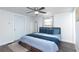 Cozy bedroom featuring a ceiling fan, a double bed, and a well-lit window for natural light at 1920 30Th E Ave, Bradenton, FL 34208
