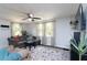 Comfortable living room with lots of natural light, a ceiling fan, and cozy seating at 1920 30Th E Ave, Bradenton, FL 34208
