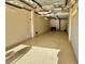 Large garage space with epoxy flooring, offering ample room for storage and parking at 223 Island Way # 5E, Clearwater Beach, FL 33767