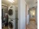 Convenient laundry area with stacked washer and dryer at 223 Island Way # 5E, Clearwater Beach, FL 33767