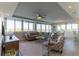Expansive living room with comfortable seating, large windows, and an open layout at 223 Island Way # 5E, Clearwater Beach, FL 33767
