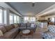 Open living space with modern furnishings, a cozy seating area, and scenic views at 223 Island Way # 5E, Clearwater Beach, FL 33767