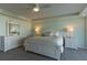 This main bedroom offers ample space and a clean, refreshing feel at 223 Island Way # 5E, Clearwater Beach, FL 33767