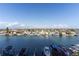 Expansive waterfront view featuring boat docks and lovely shoreline homes at 223 Island Way # 5E, Clearwater Beach, FL 33767