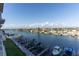 Stunning waterfront view of the canal from the condo, featuring boat docks and beautiful scenery at 223 Island Way # 5E, Clearwater Beach, FL 33767